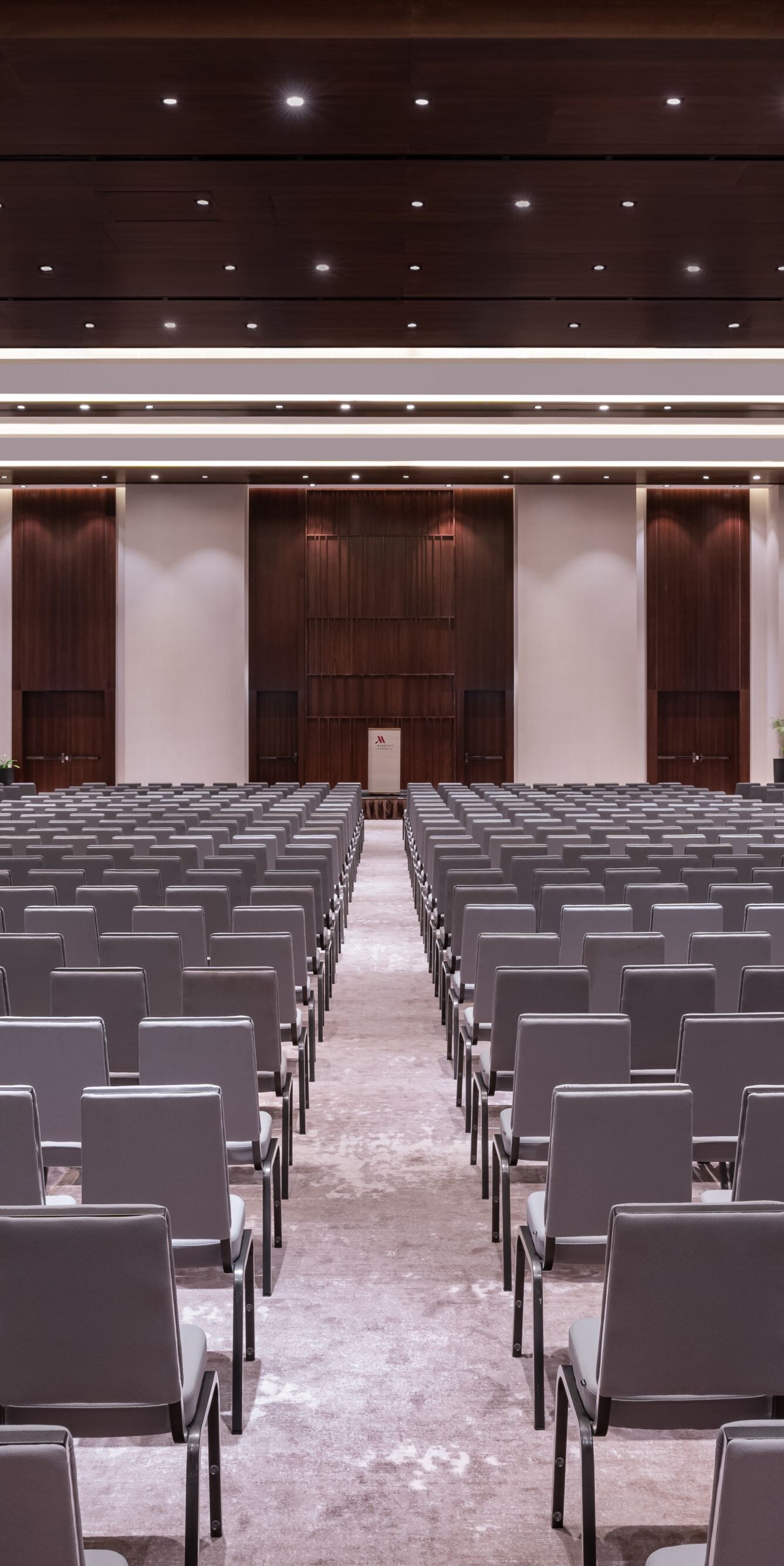 Ballroom with theater seating and podium