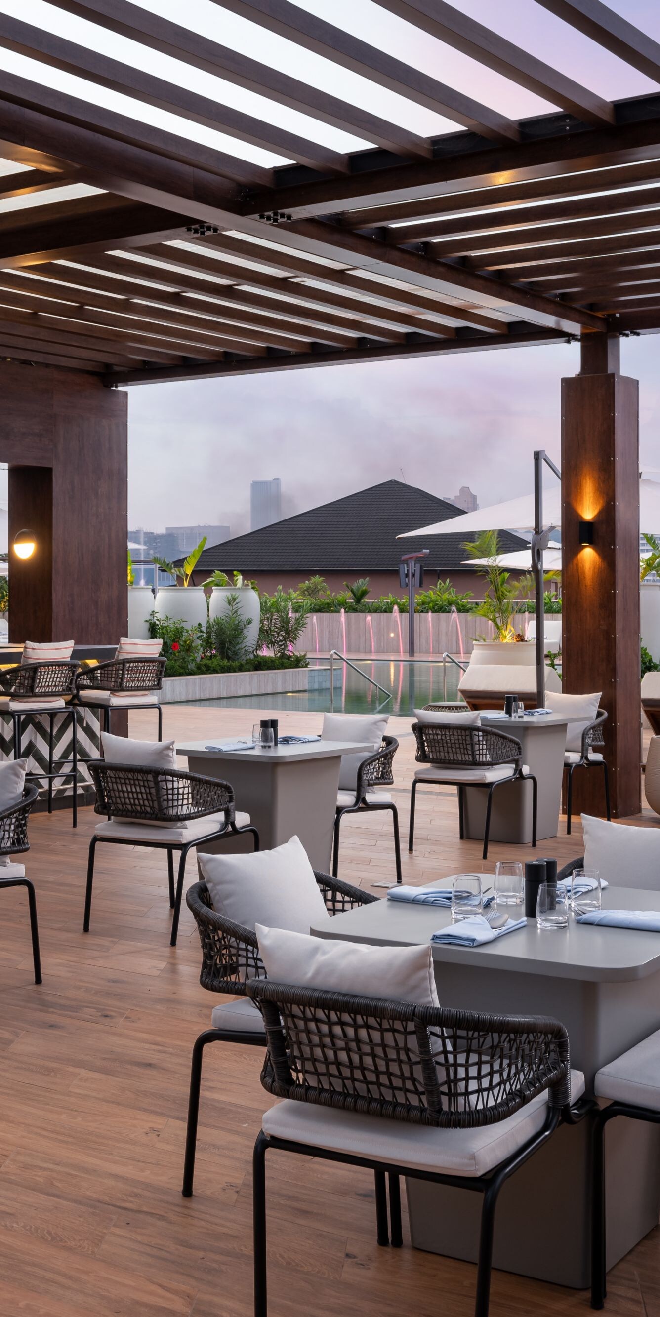 Rooftop bar with pool and city views