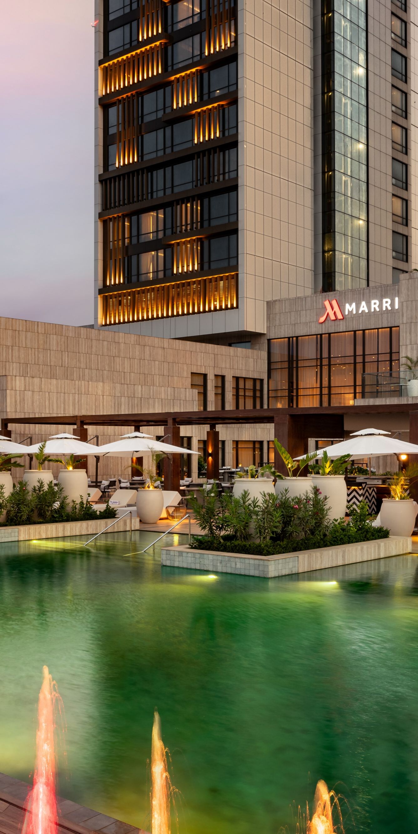 Outdoor pool with fountains and terrace