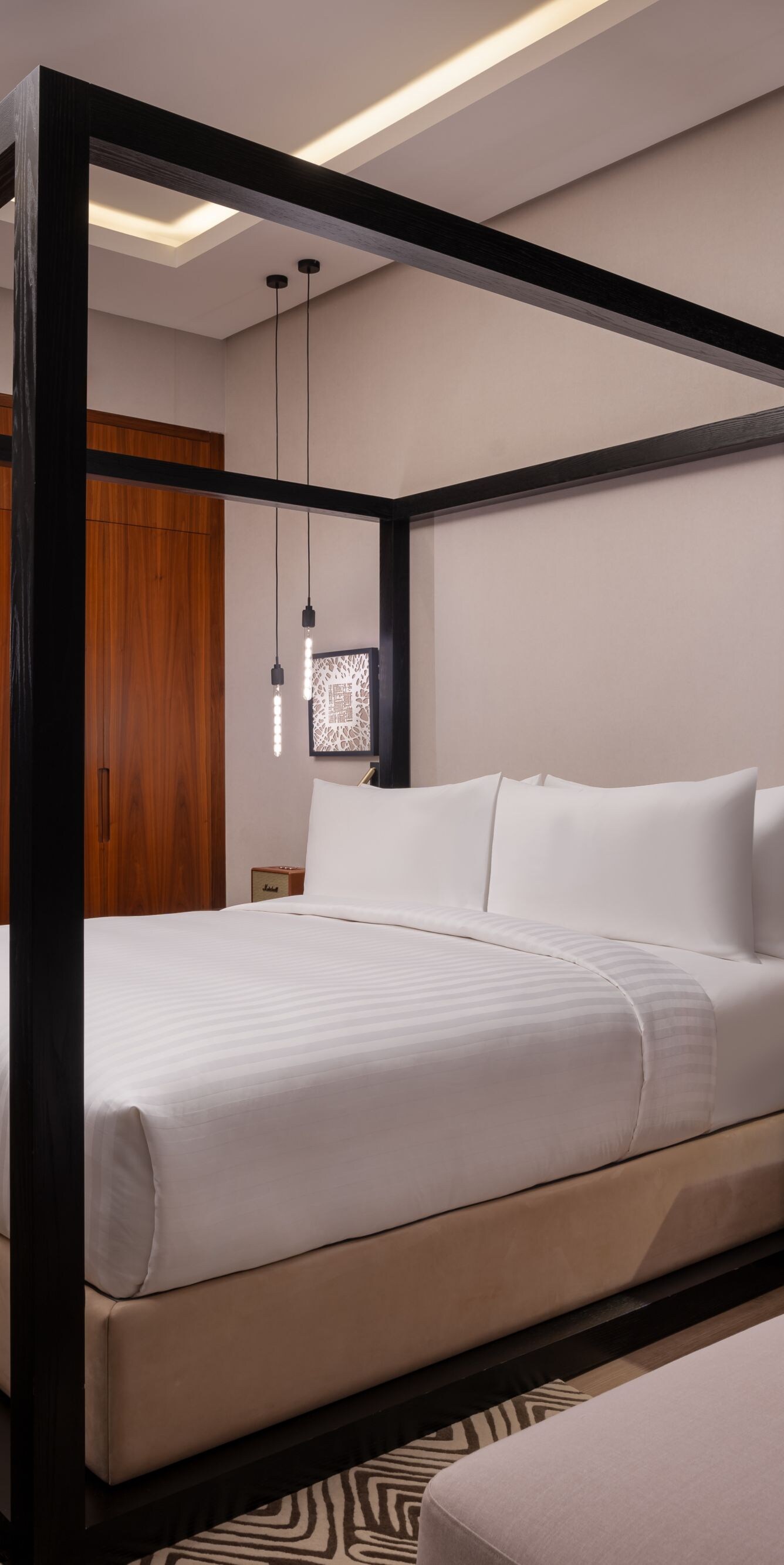 King guest room with canopy bed and tub