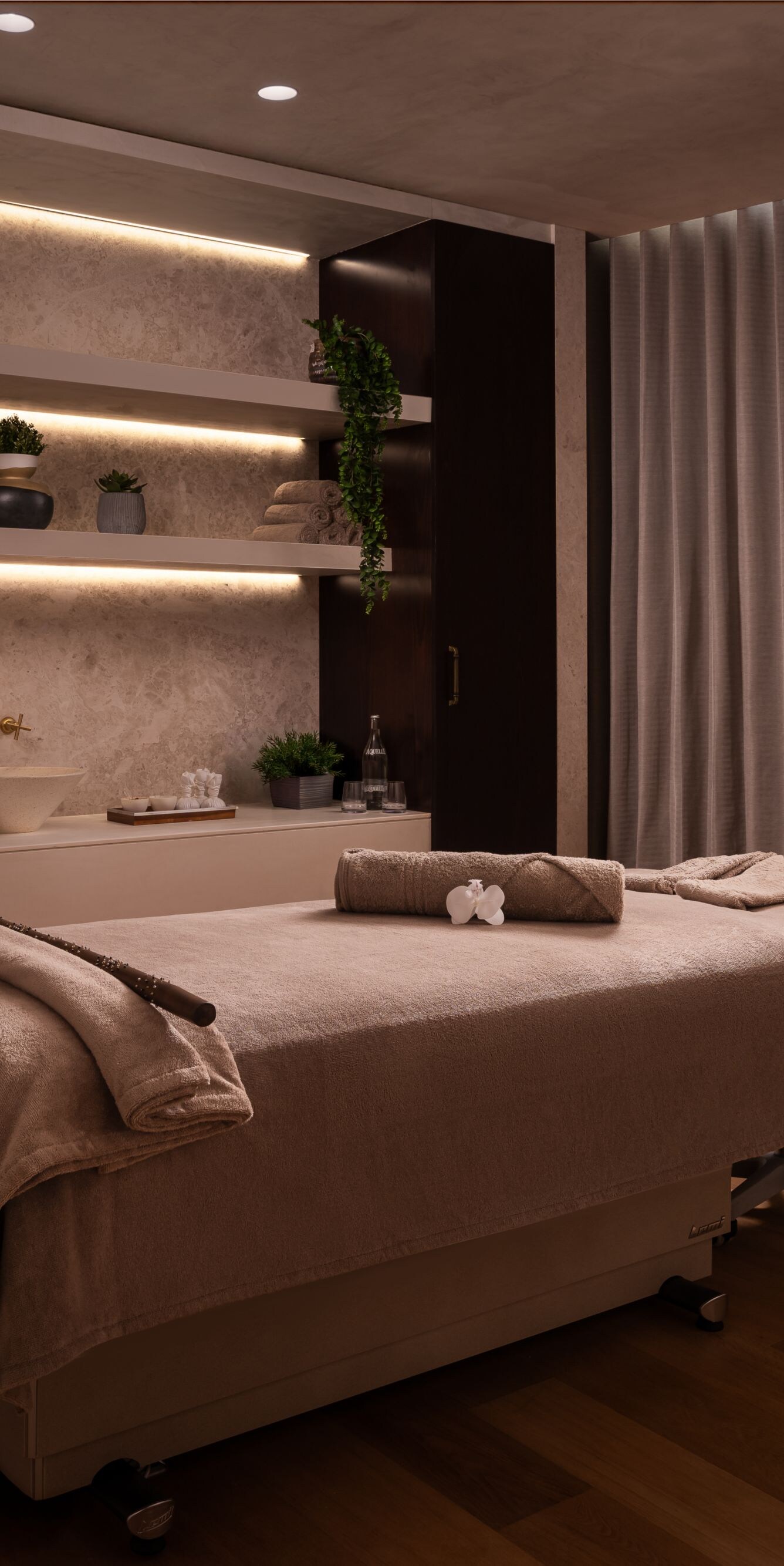 Spa treatment room with massage table