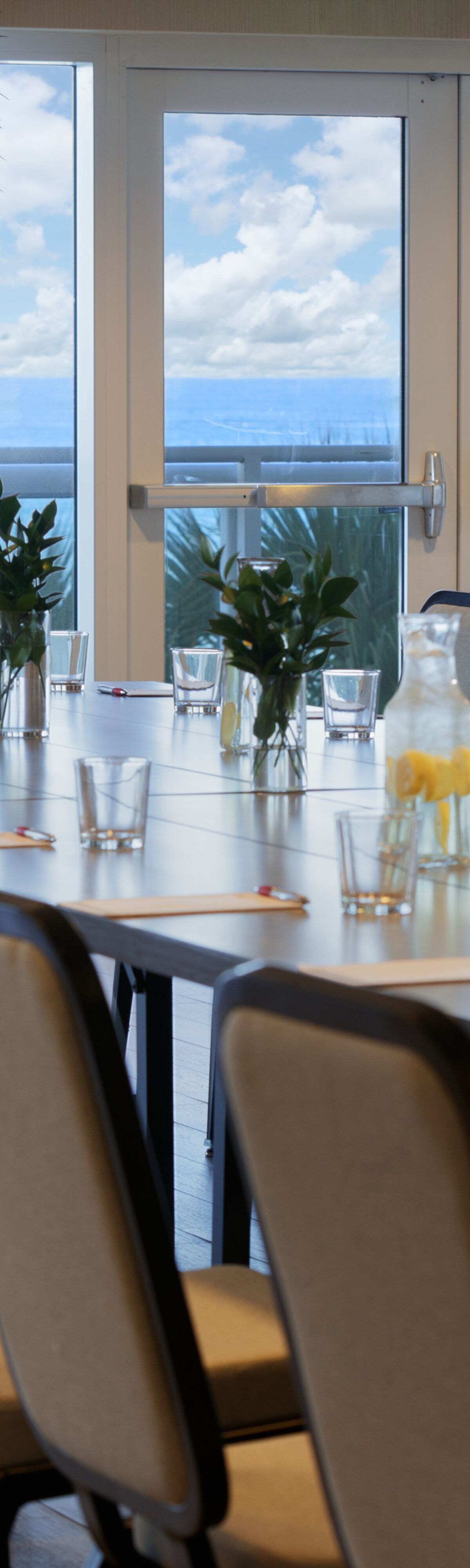 Boardroom setup with ocean view