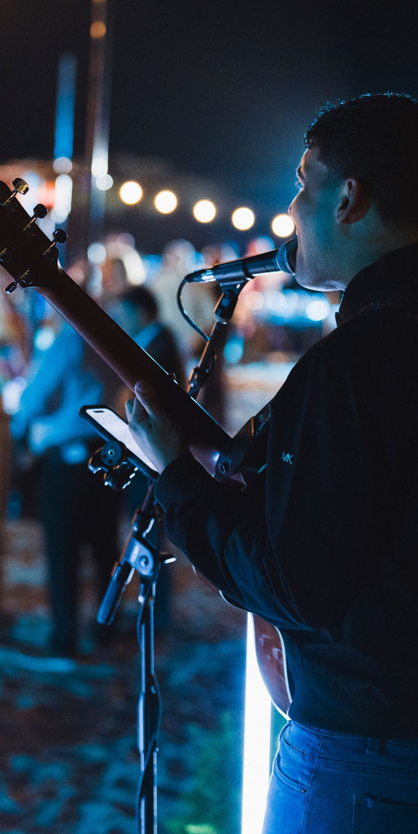 Man, guitar, singing