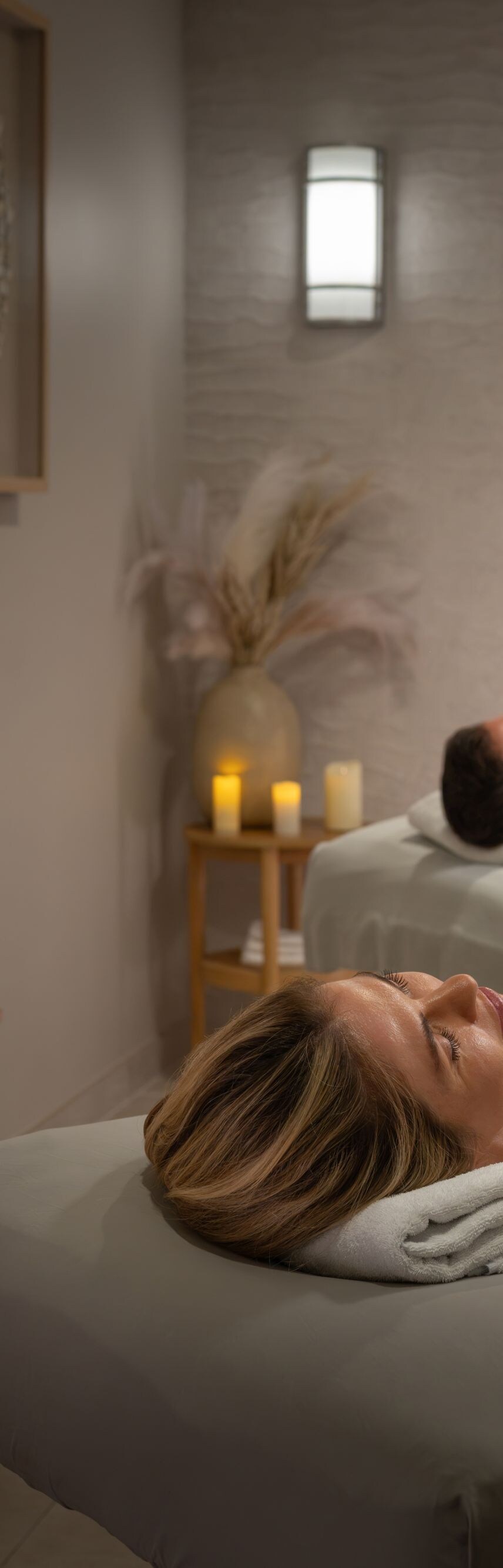 couple relaxing on massage tables