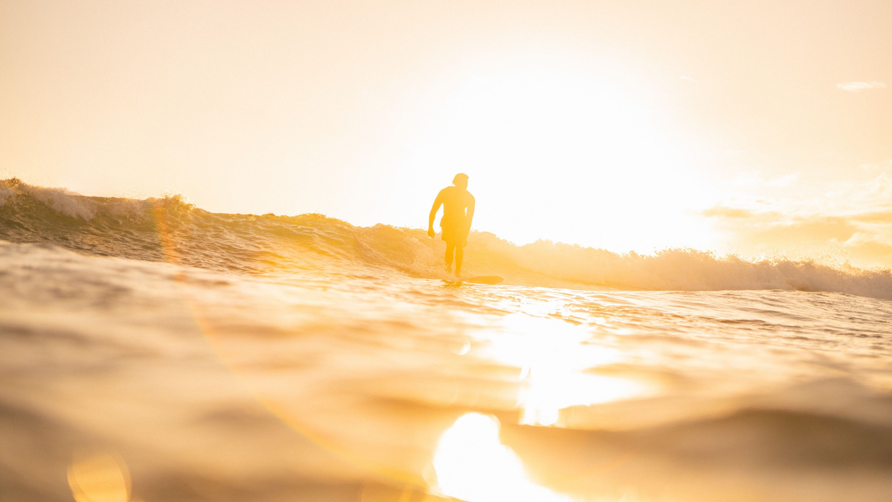 silhouette of man, surfing