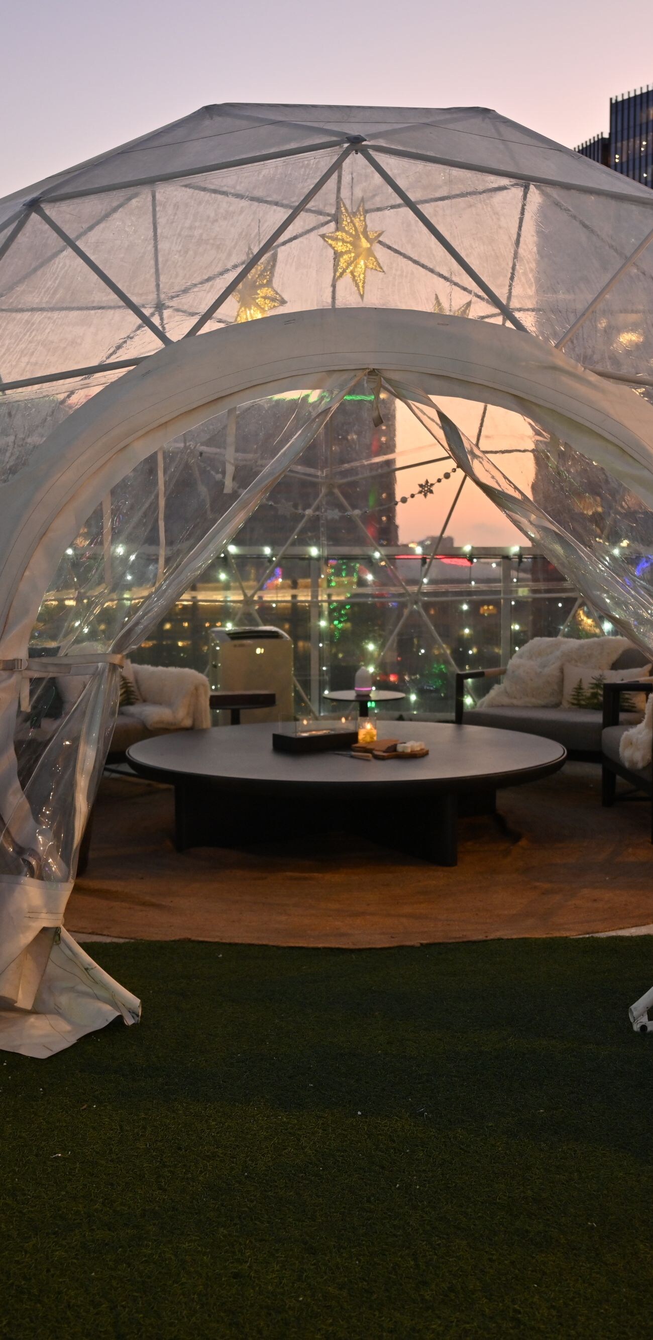 Rooftop igloo with cozy holiday décor