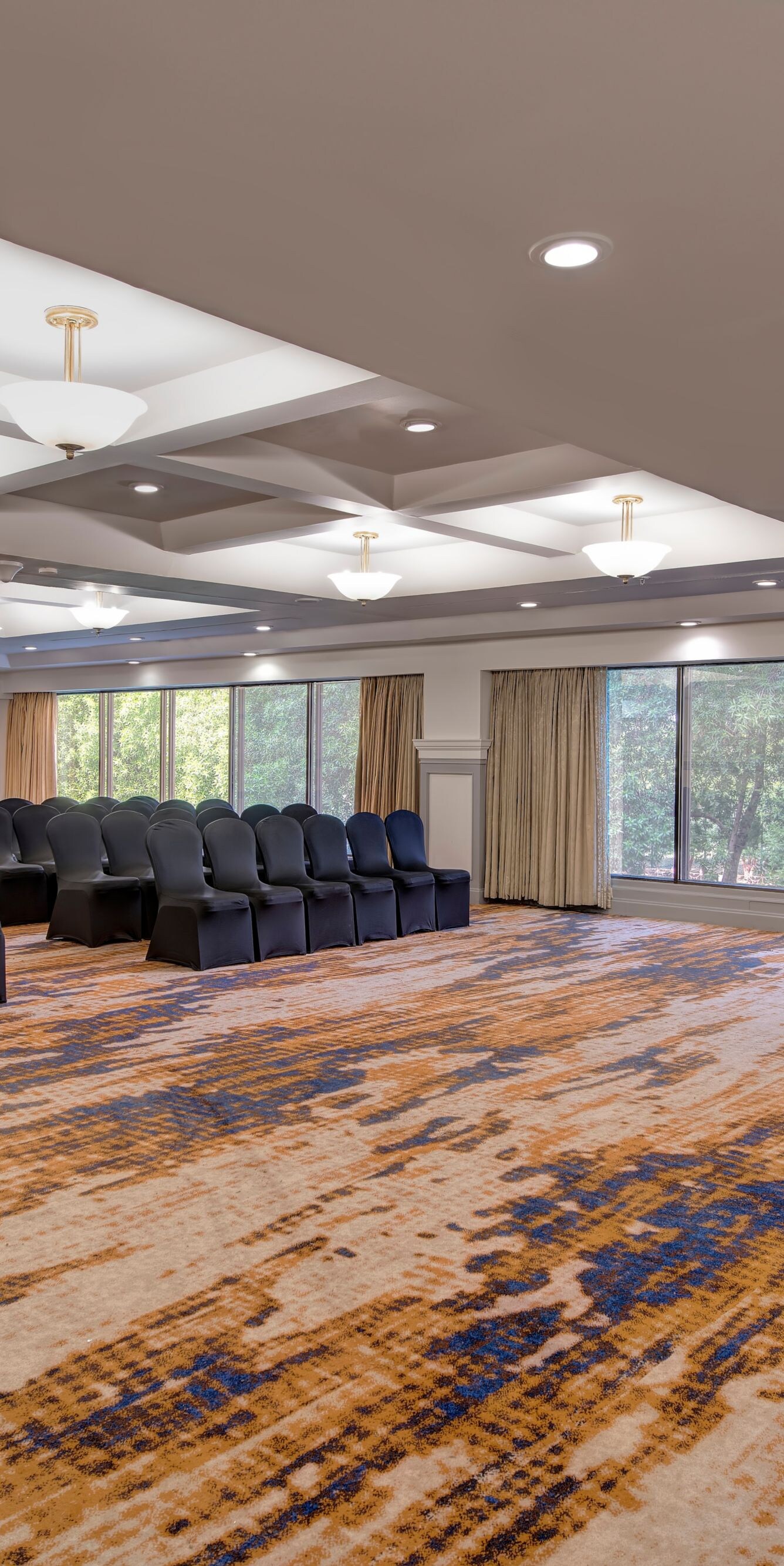Conference room with chairs and podium by windows