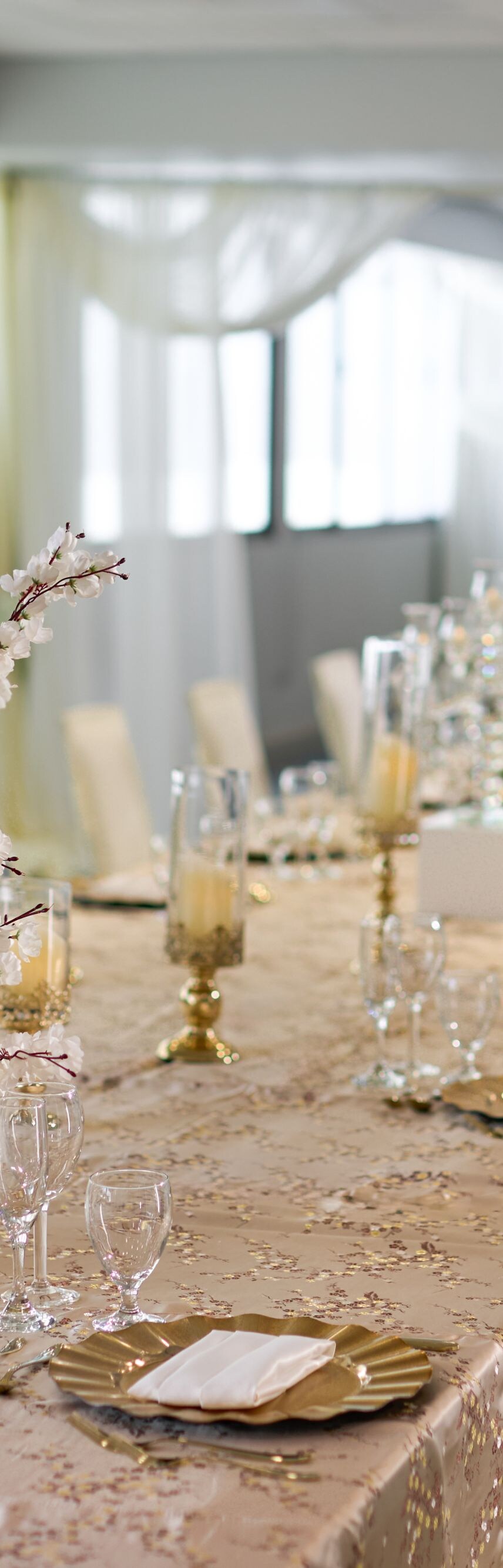 Long banquet table with floral centerpieces