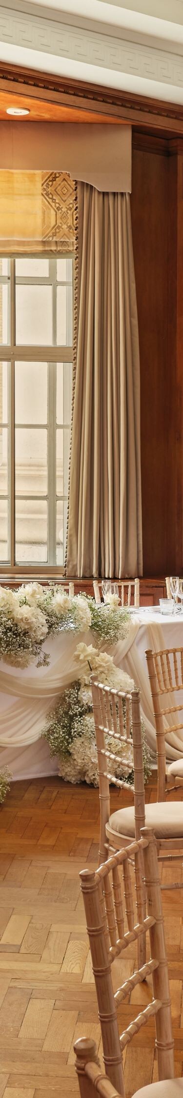 Wedding banquet tables in ballroom