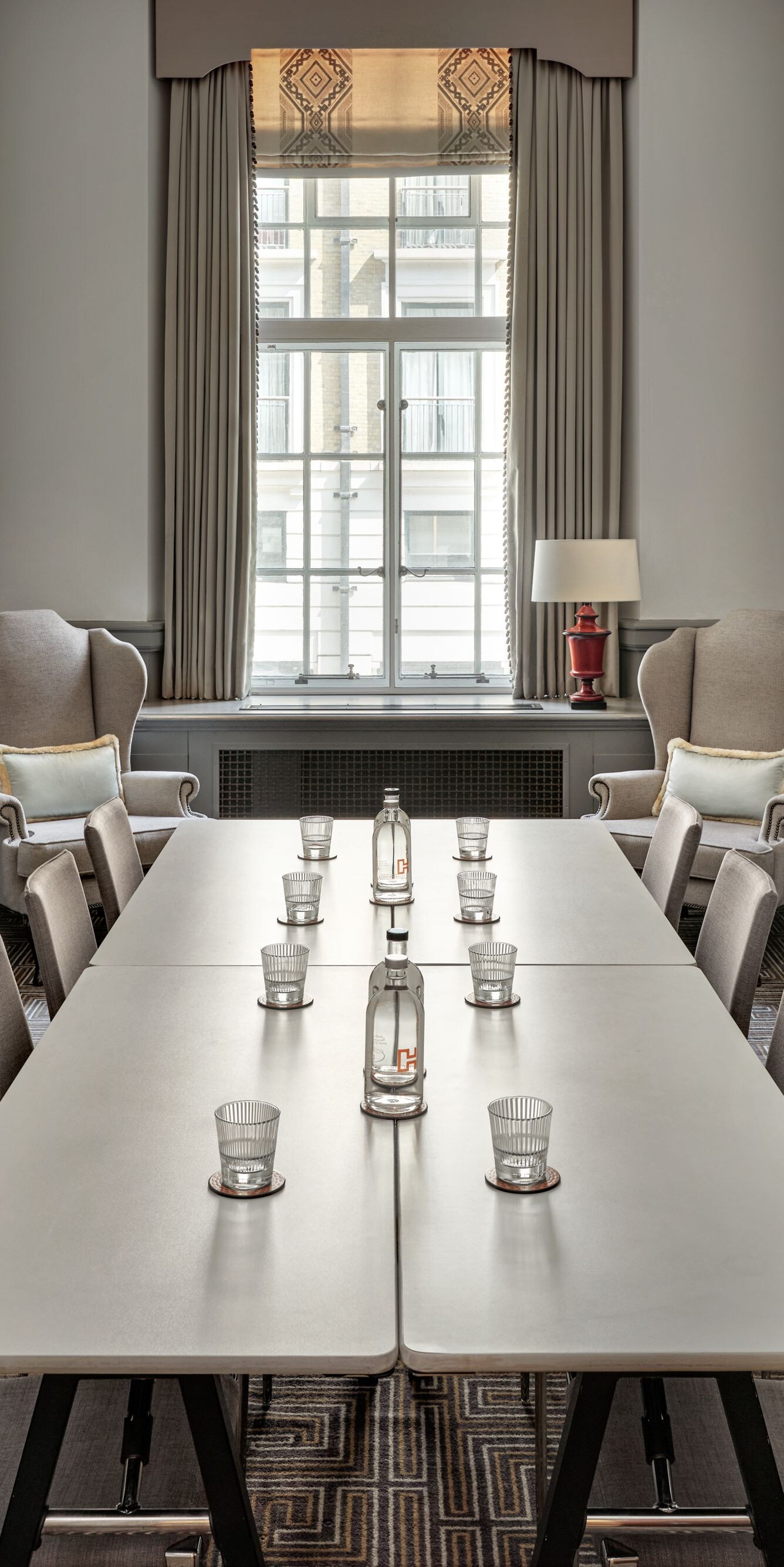 Small boardroom setup for eight guests