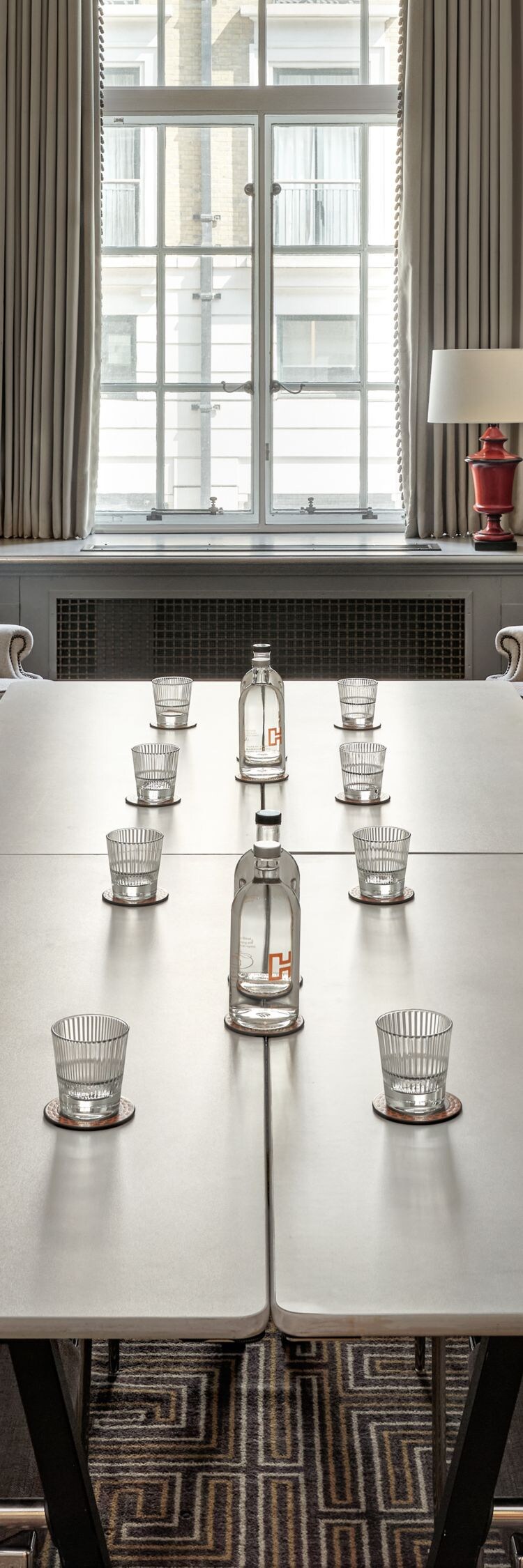 Small boardroom setup for eight guests