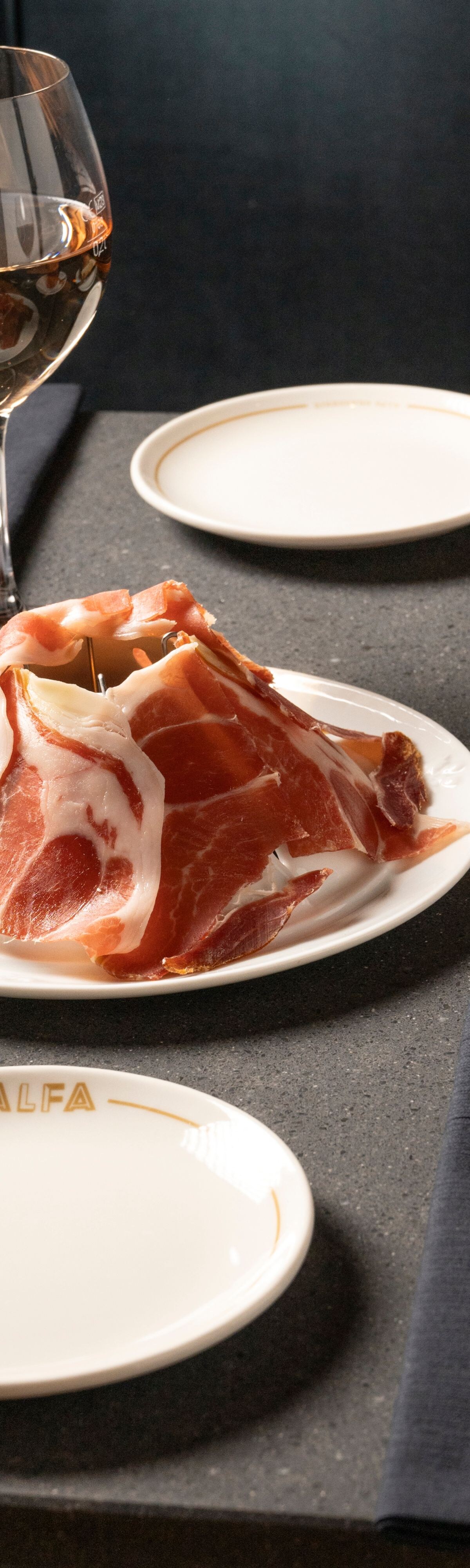 Triangular charcuterie plate with candle
