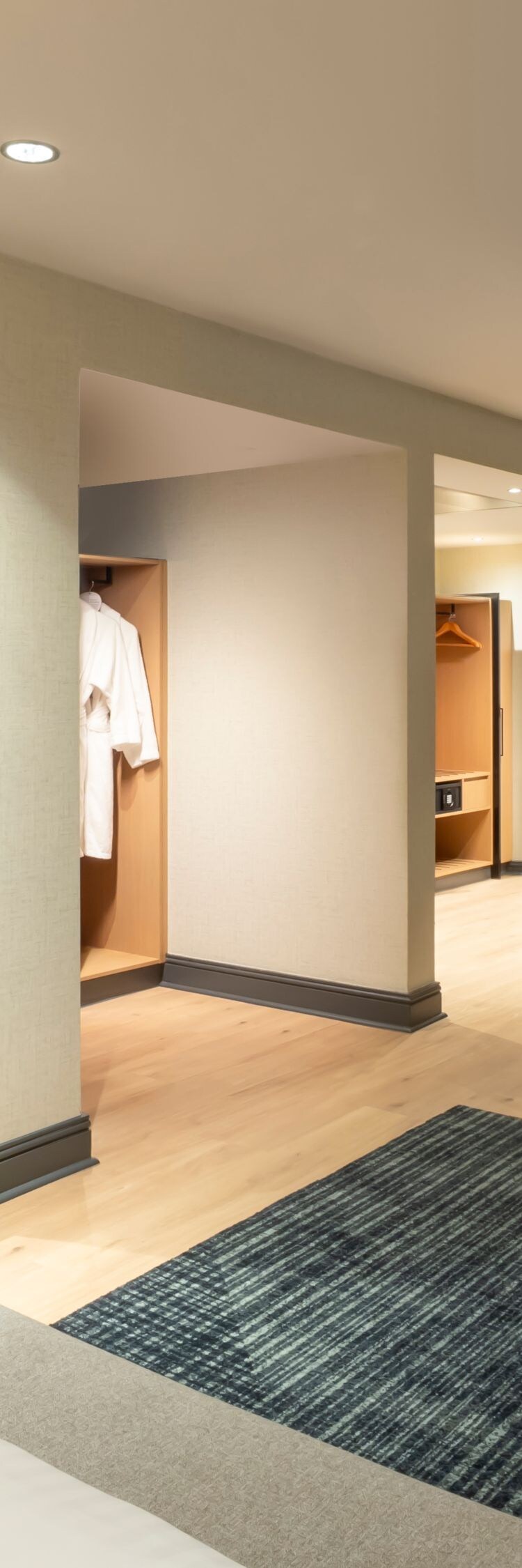 Bedroom with desk, television and wardrobe