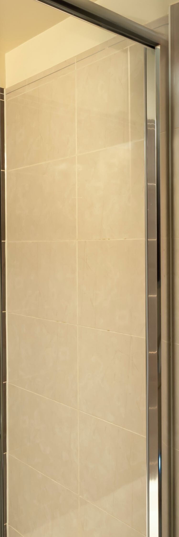 Bathroom with glass shower and bathtub
