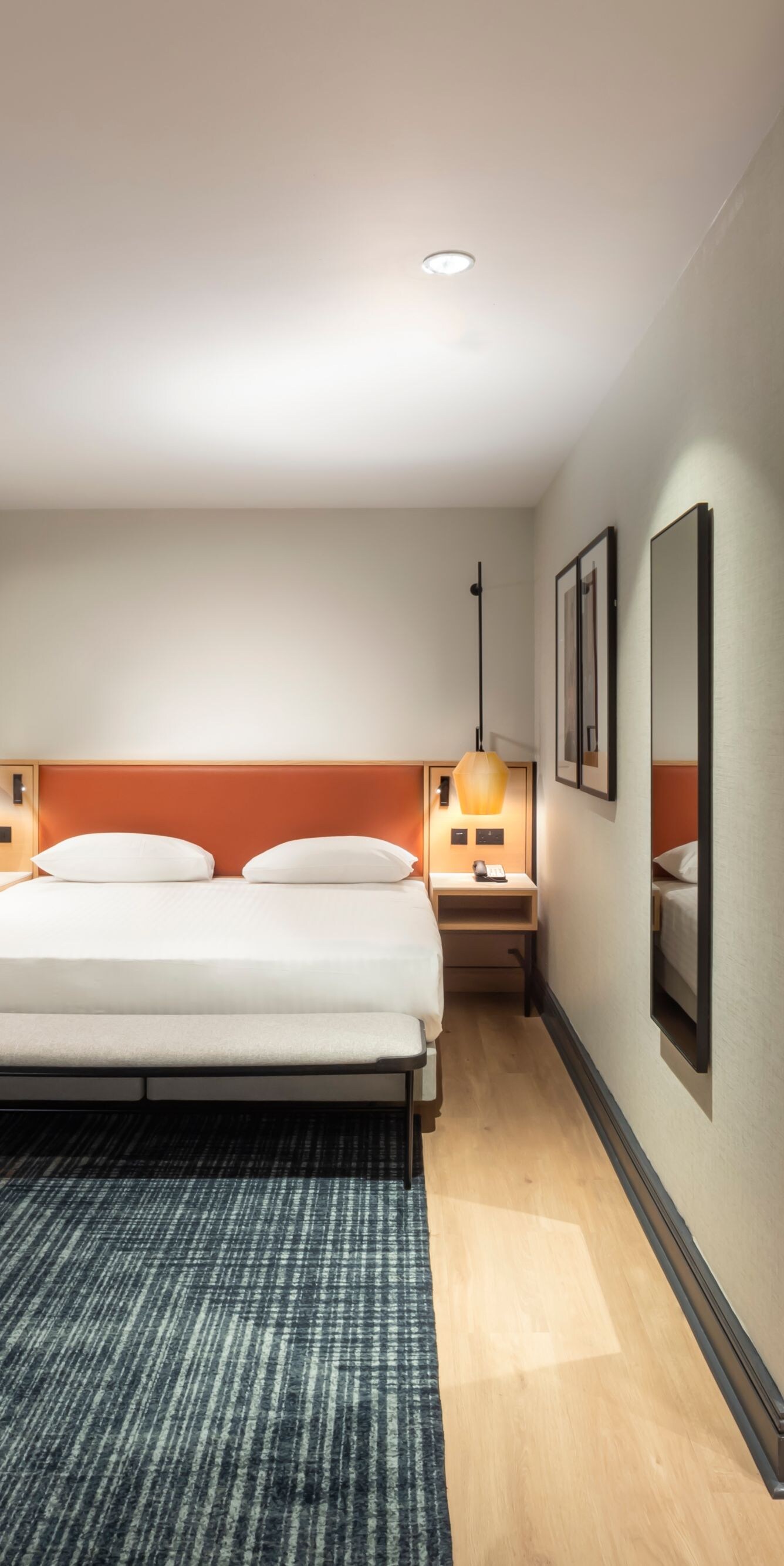 King bedroom beside bathroom with bath