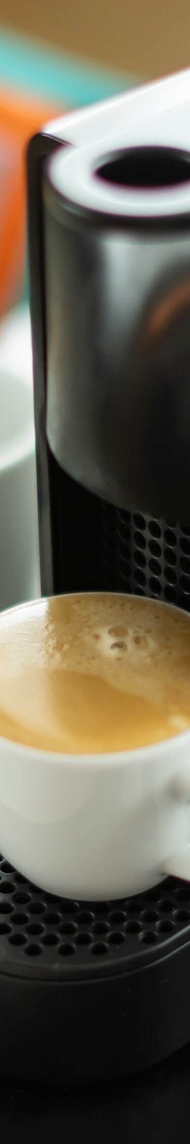 Espresso machine with cups and coffee