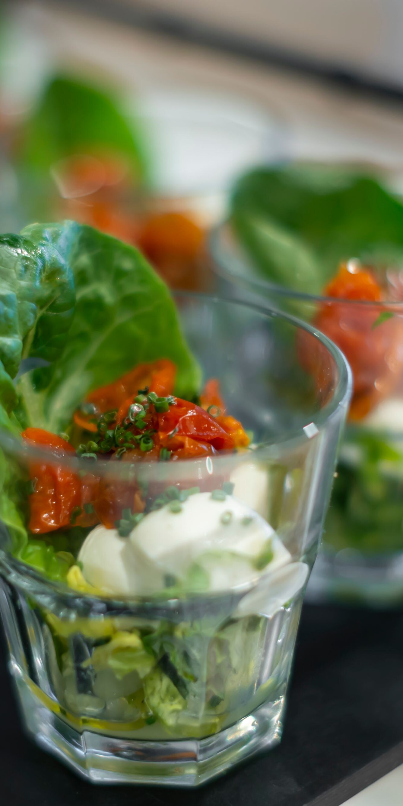 Individual salad cups with cheese and tomato