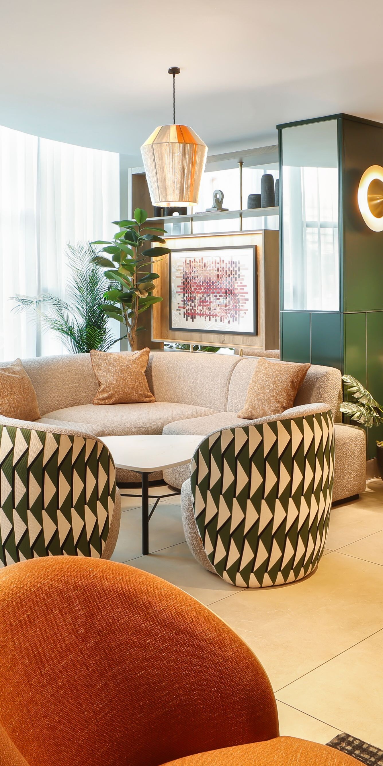 Bright Great Room lounge with sofas and chairs