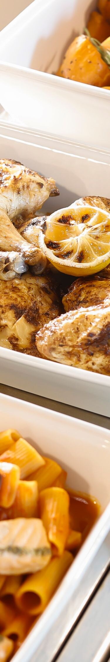 Hot buffet with pasta, chicken and potatoes