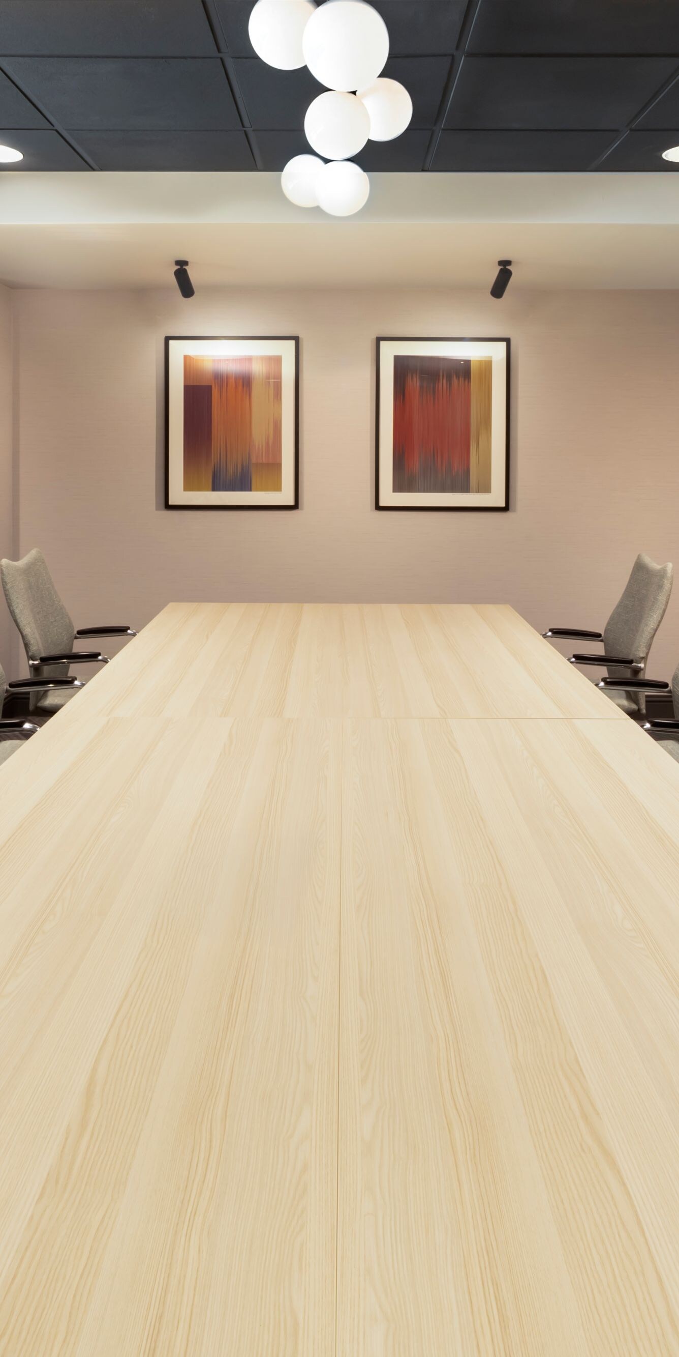 Executive boardroom with table and screen