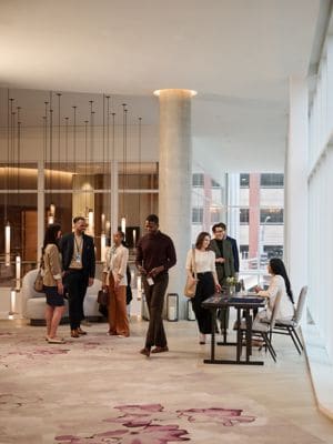 A group checking into a event space