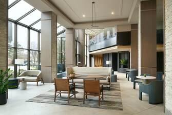 Hotel lobby seating with windows.
