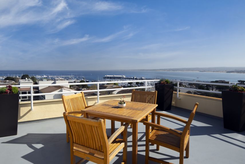 Outdoor dining with view of Monterey