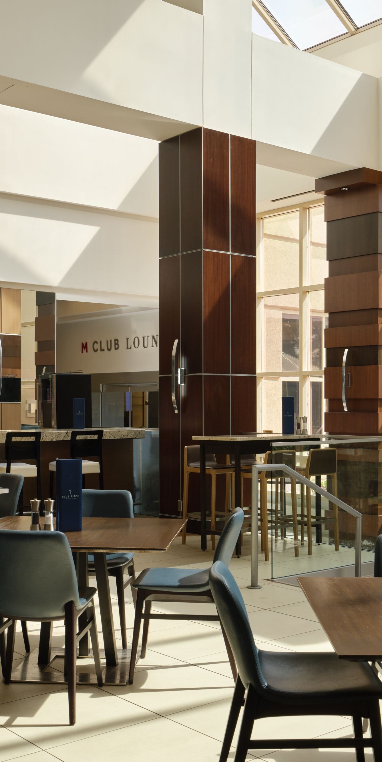 Wide view of hotel bar and seating