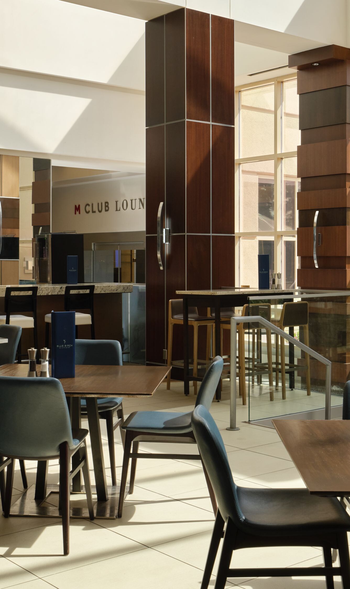Wide view of hotel bar and seating