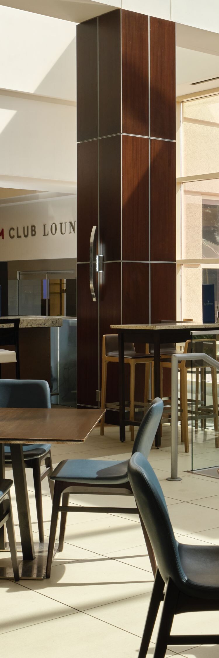 Wide view of hotel bar and seating