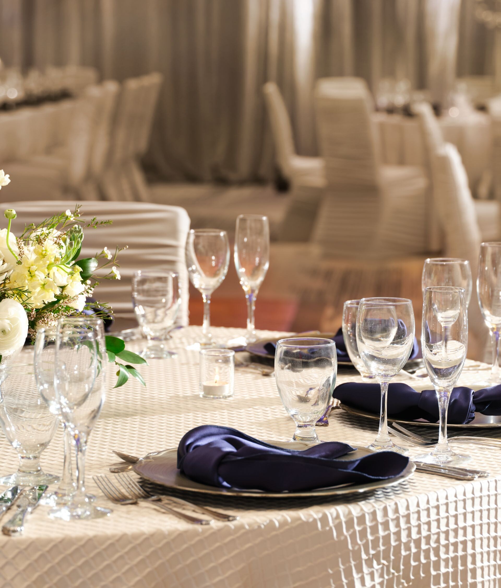Set banquet tables in ballroom