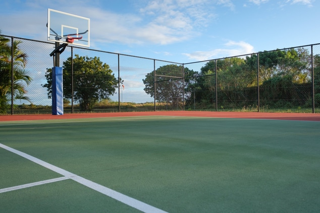 Guests can play tennis or basketball at the resort