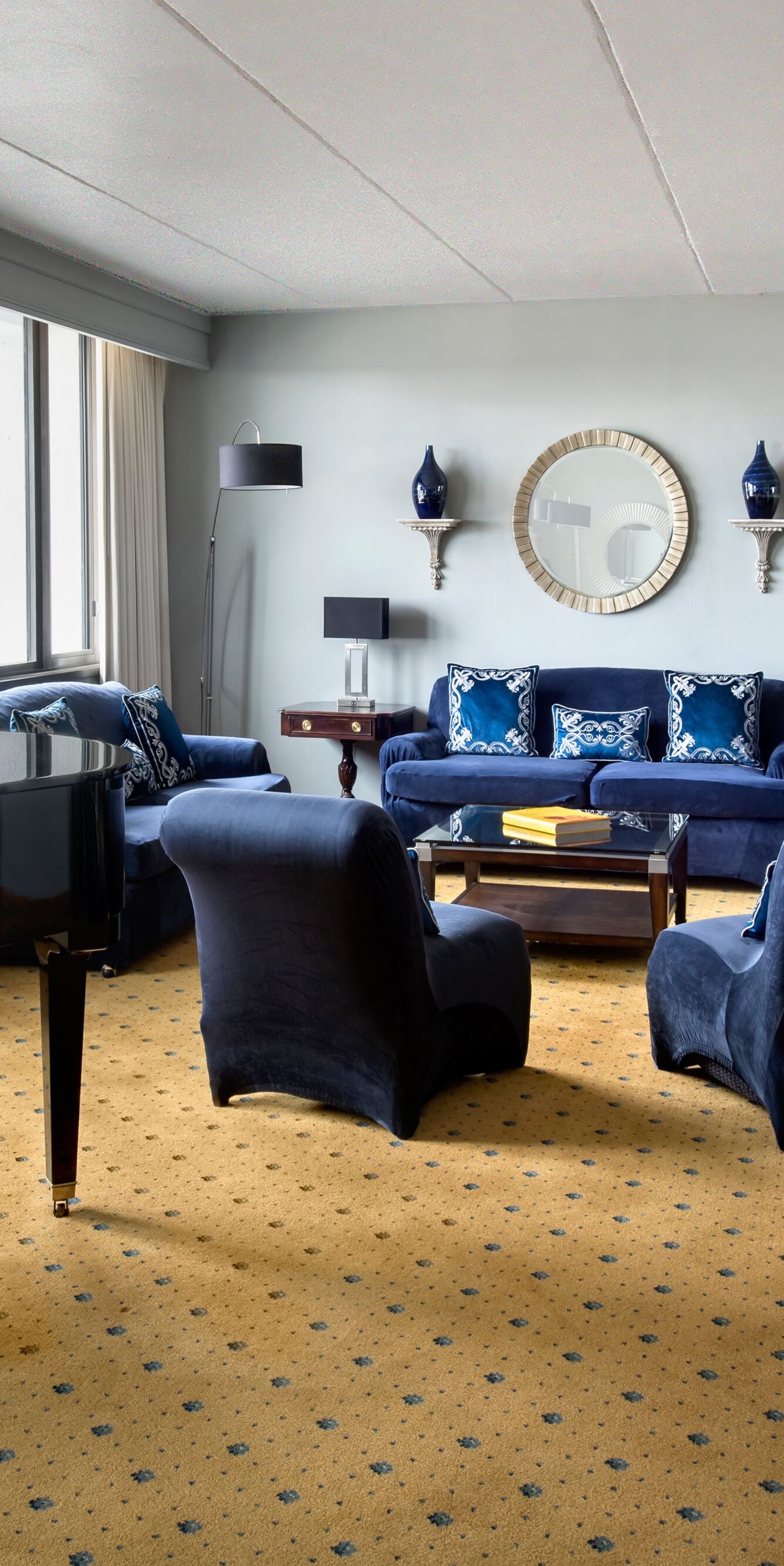 Presidential suite living room with piano