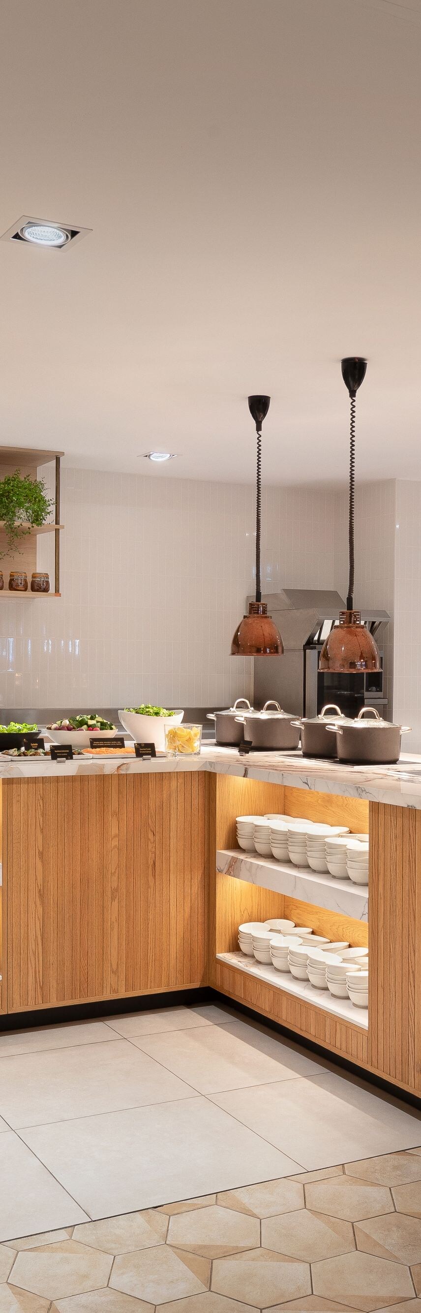 Open breakfast kitchen with buffet counters