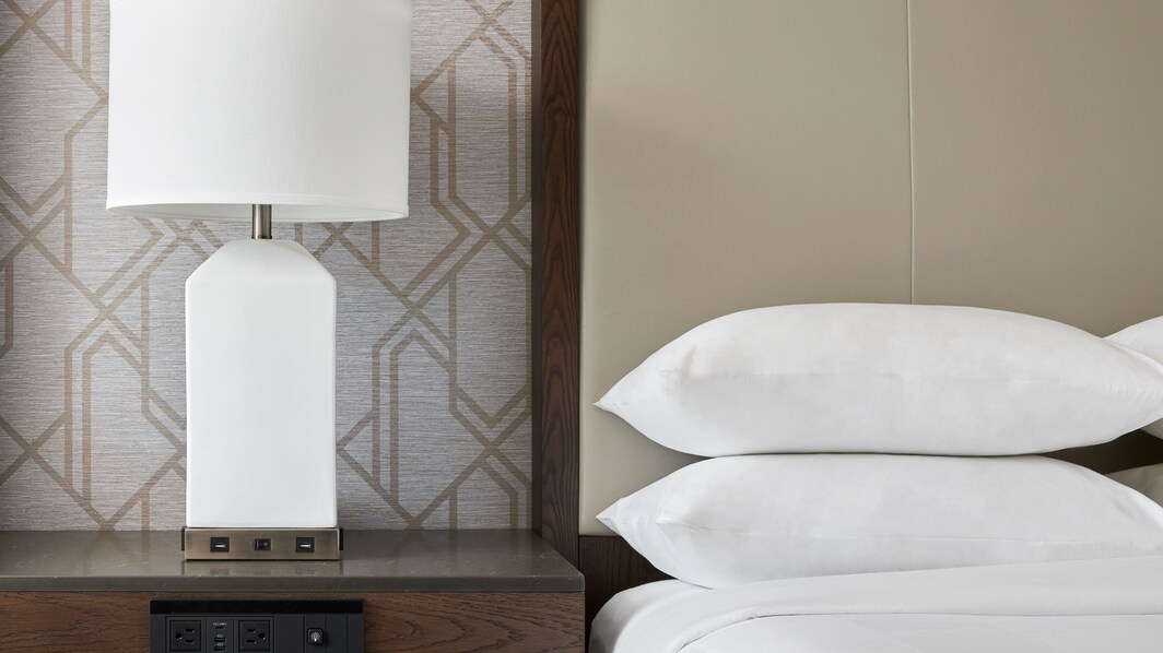white lamp and pillows