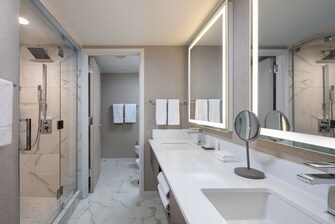 two sinks shower separate bathroom