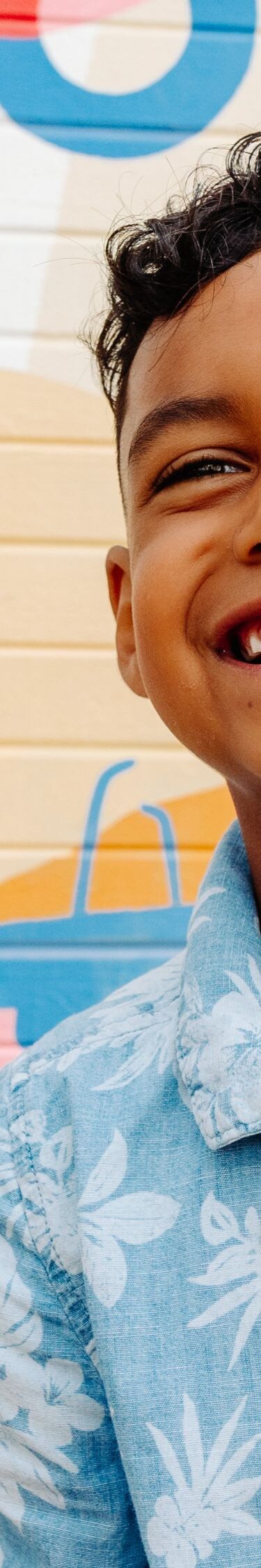 kid laughing with bubbles 