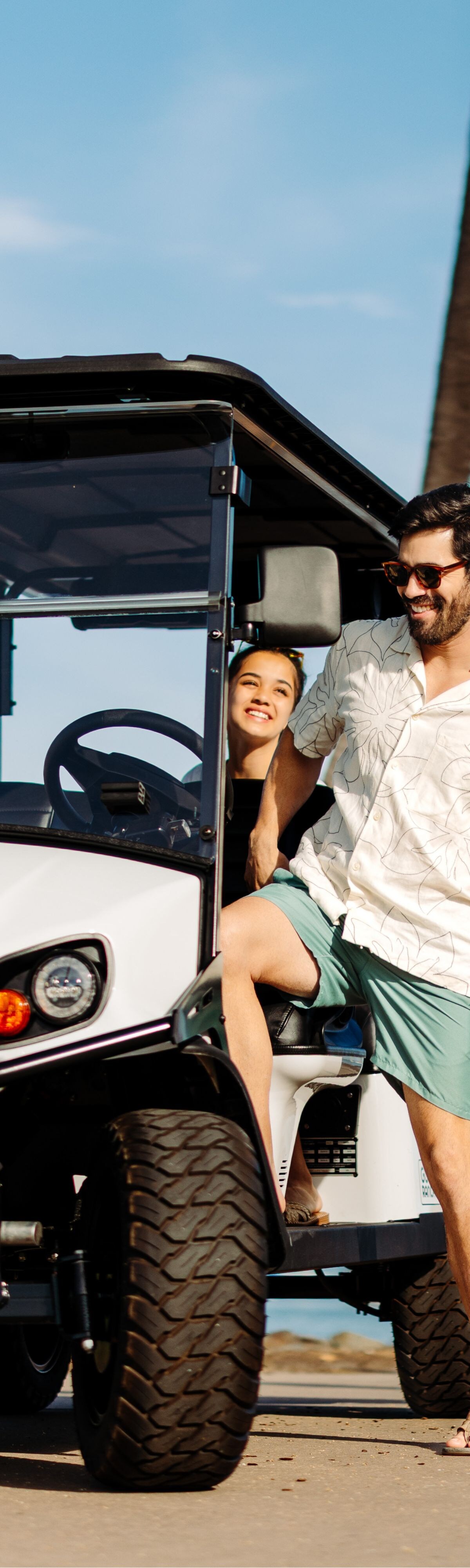 Family getting in a golf cart
