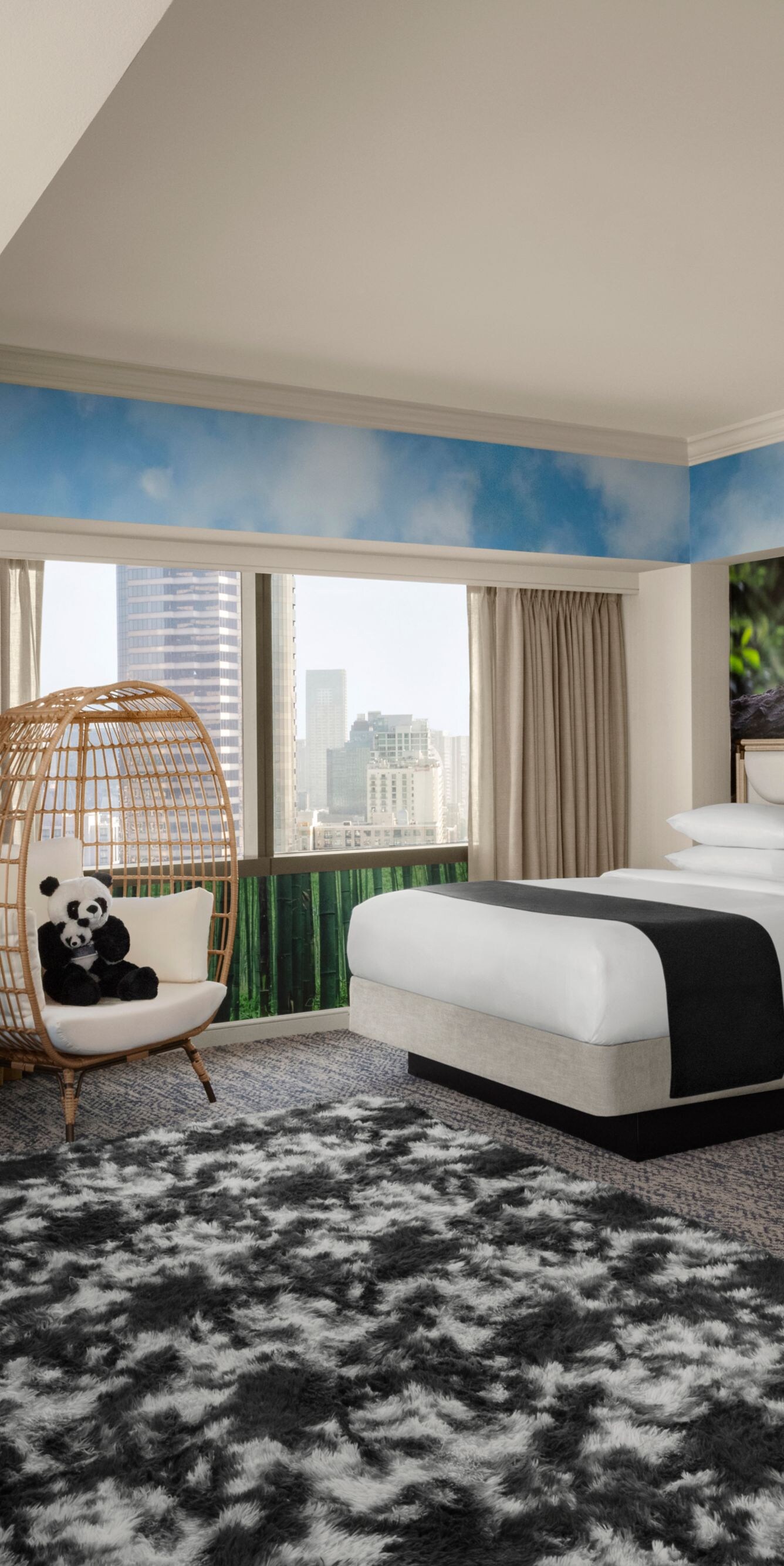 Hotel room with panda decor and two beds