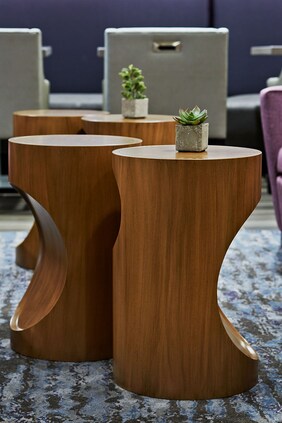 modern wooden end tables nestled together