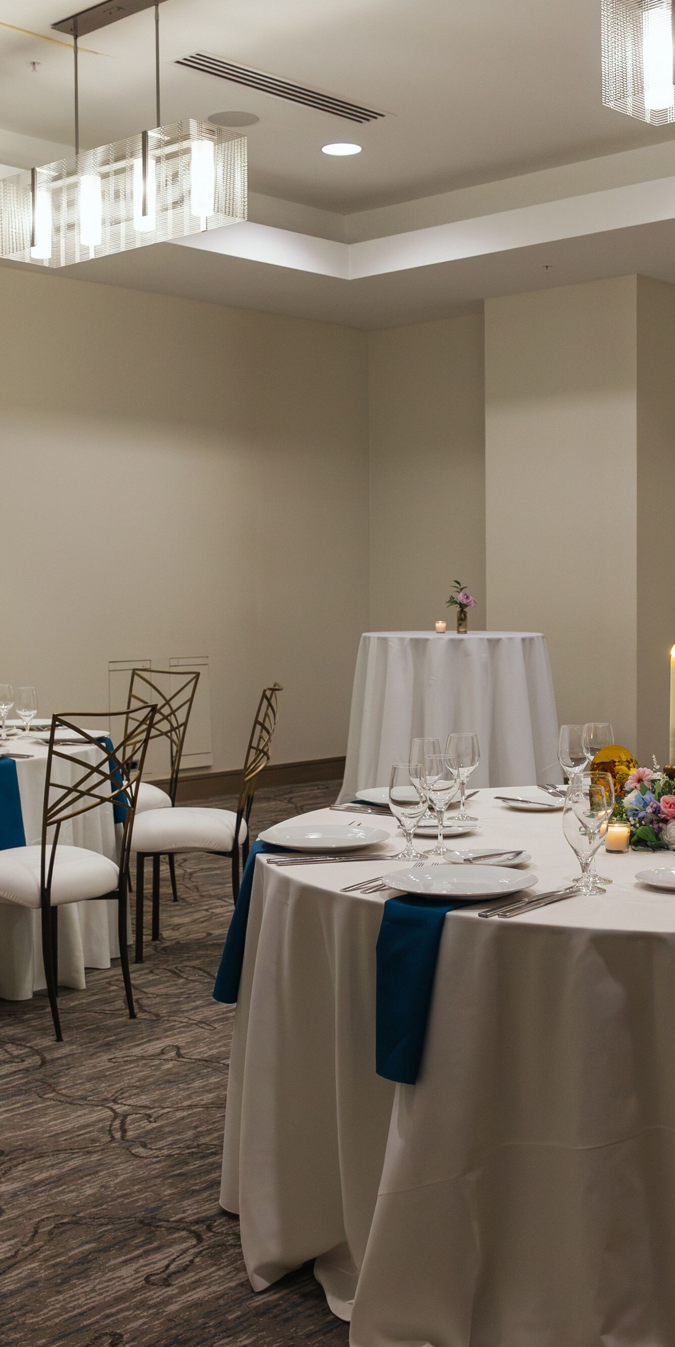 Event space with round tables and decor