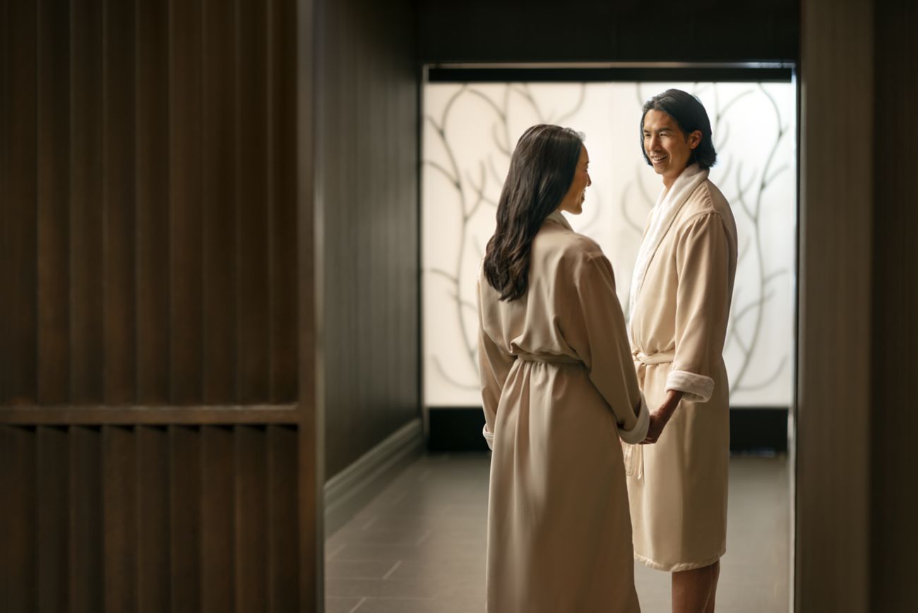 Man and woman couple in spa robes