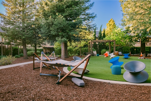 Lawn with swivel chairs and hammocks