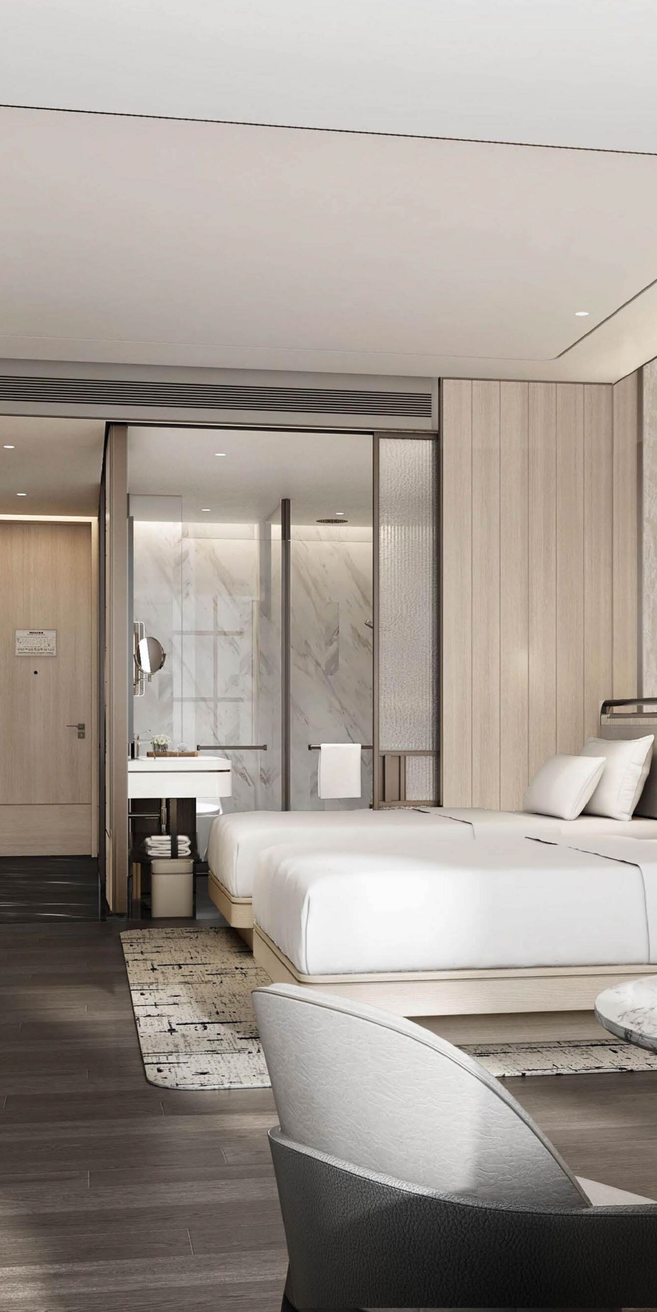Guest room with two beds and marble table