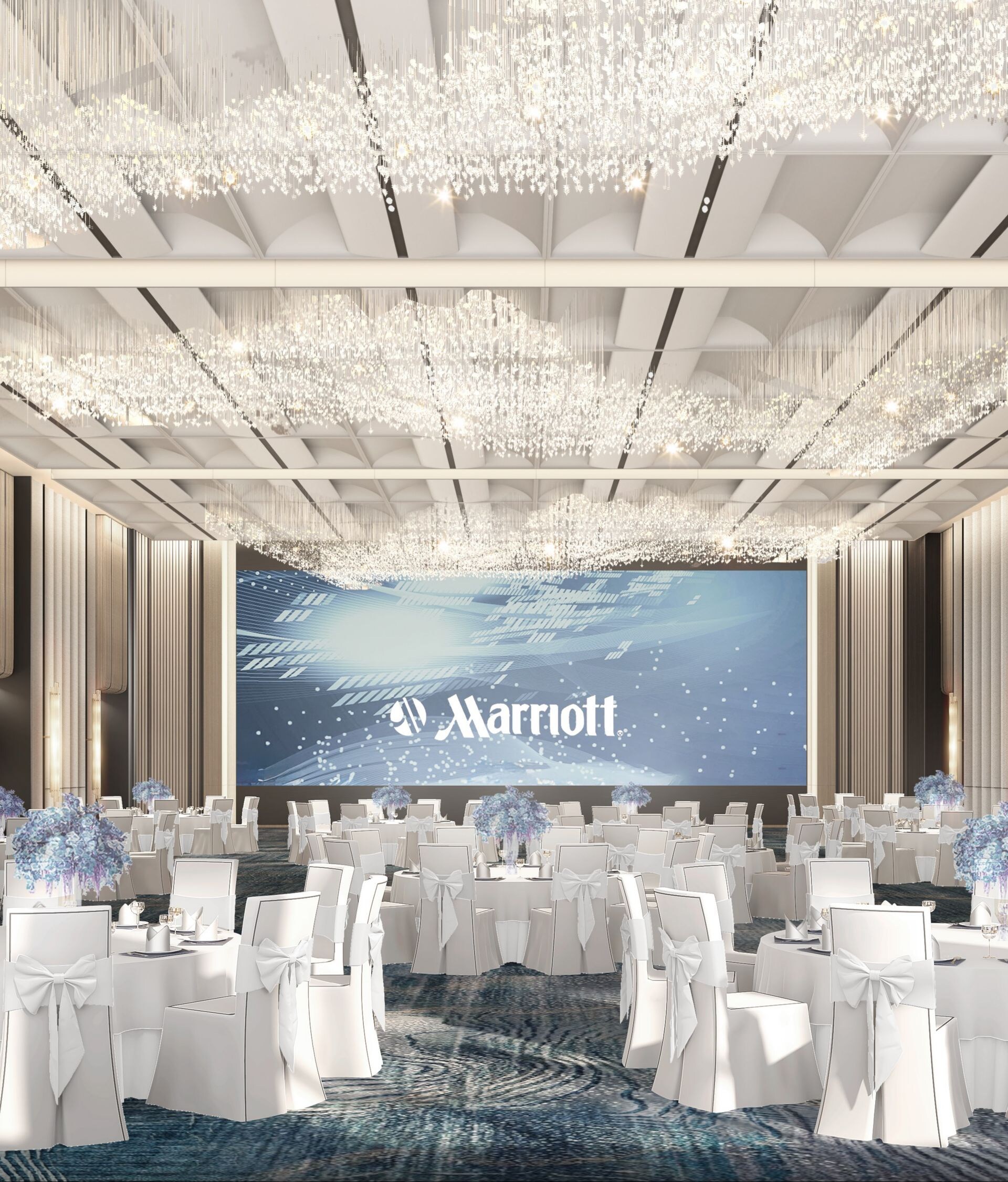Ballroom with banquet setup and chandeliers