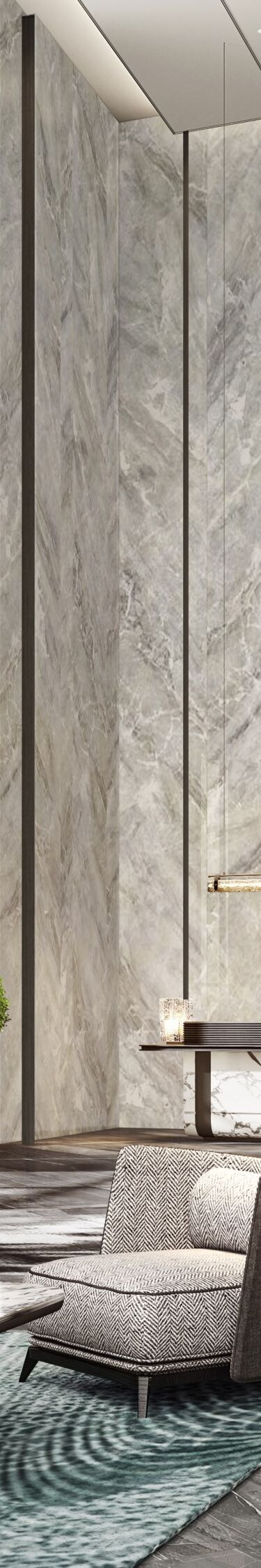 Lobby with marble walls and seating area