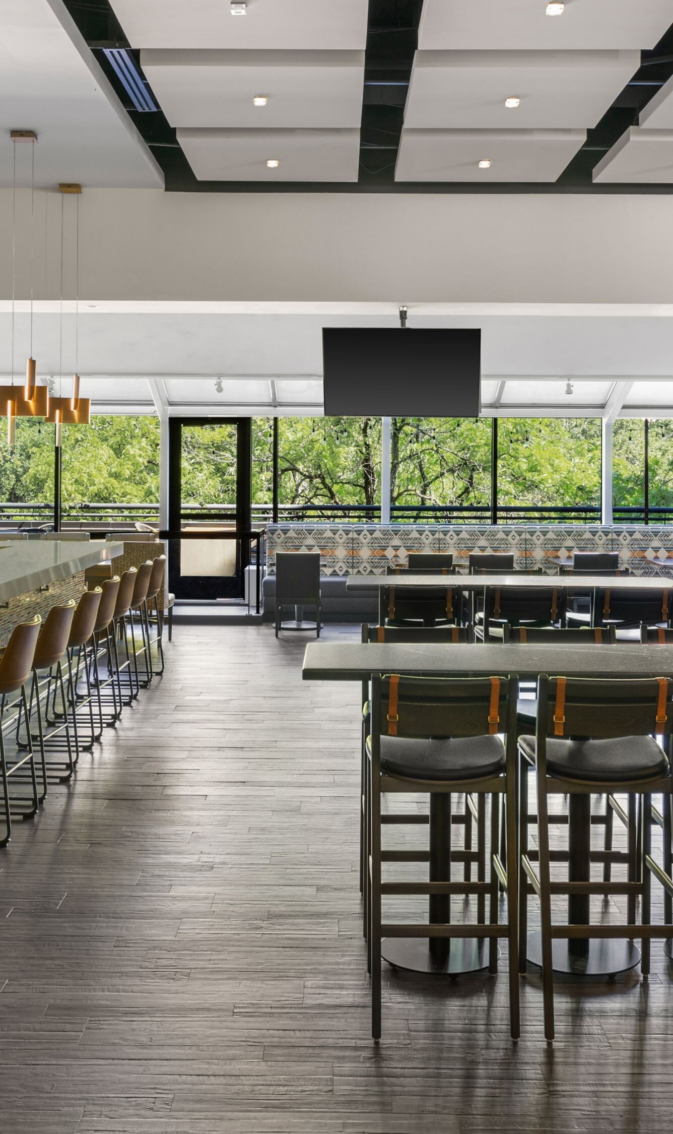 Restaurant with bar, tables and chairs