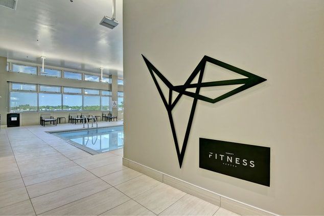 Fitness Center Sign and indoor swimming pool