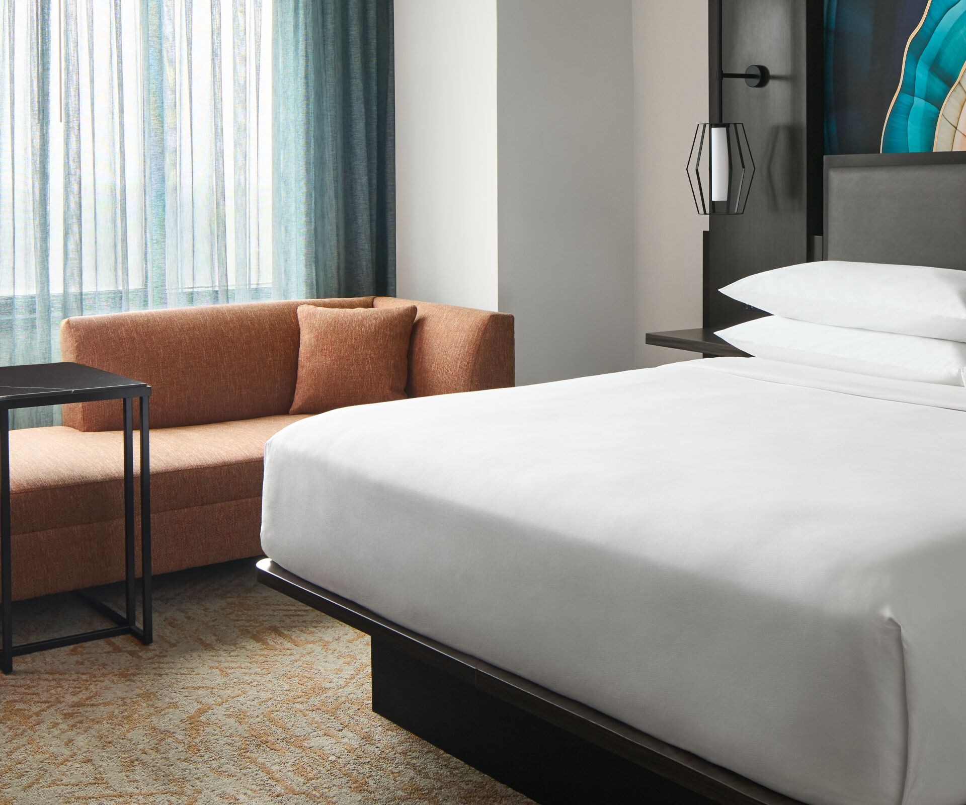 king bed in guest room with Seating