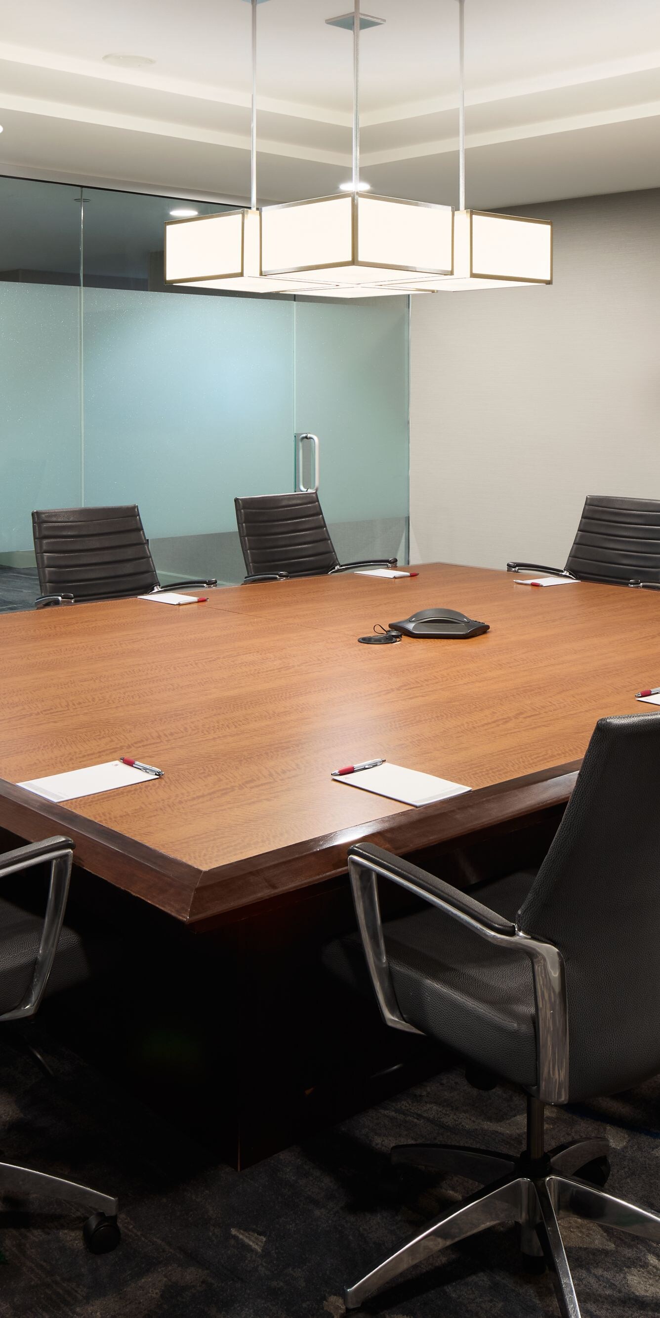 Boardroom with table and wall display